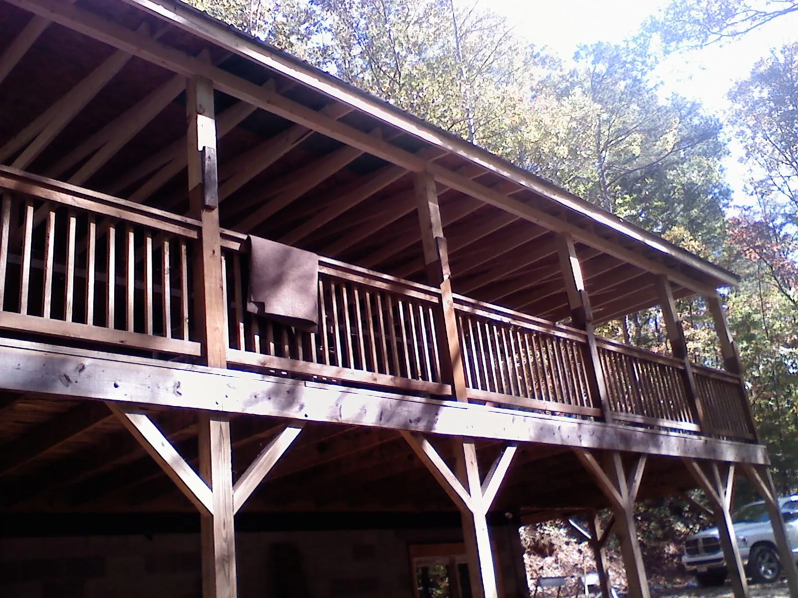 Timber framing under a new elevated porch and deck in South Dayton